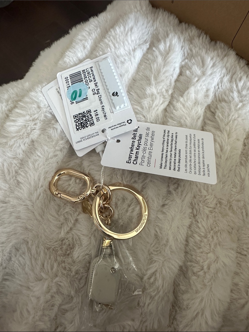 Everywhere belt bag charm keychain Gold Tone Key Ring Charm with Cream Accent